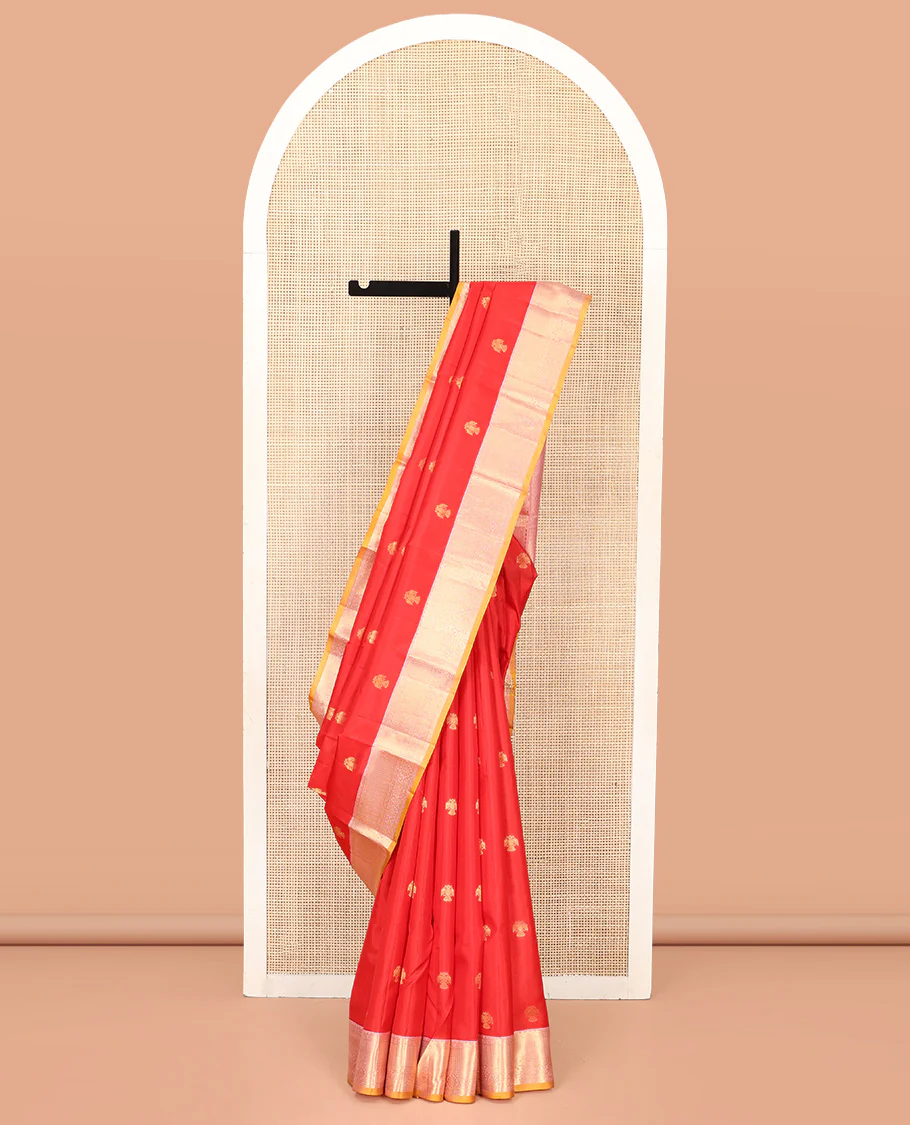 Red Vasundhara Silk Saree, Beautifully Bedecked with Iruthalai Pakshi Buttas All Over Its Body, Complemented by a Contrast Border of Rekku, Then Kuli Kann, and Kodi Visiry Designs, Grand Pallu, and Paired with a Contrast Blouse