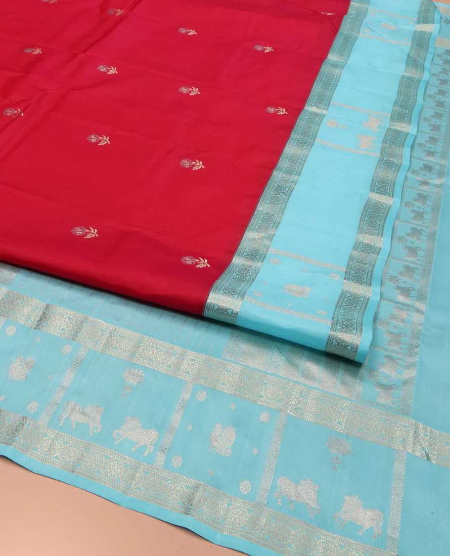 Red Vasundhara Silk Saree, Embellished with Floral Buttas on Its Body, Complemented by Contrast Border of Kodi Visiry, Annam, Pichwai Cow and Lotus Designs, Meticulously Crafted Pallu, and Paired with a Contrast Blouse - Image 2