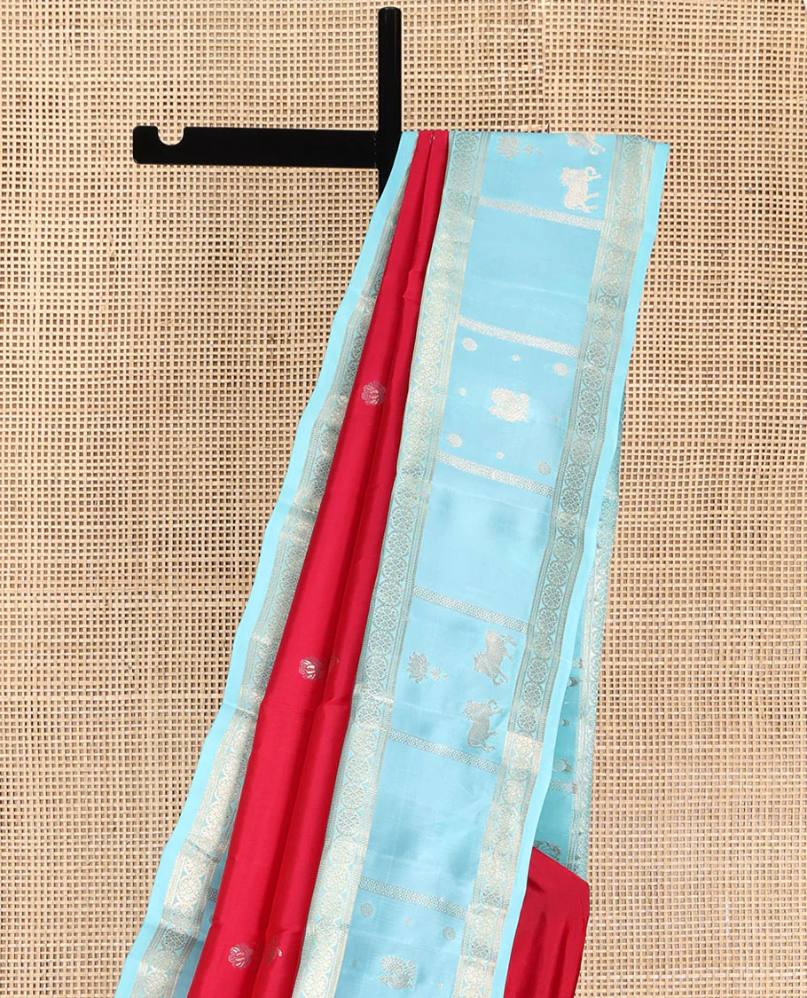 Red Vasundhara Silk Saree, Embellished with Floral Buttas on Its Body, Complemented by Contrast Border of Kodi Visiry, Annam, Pichwai Cow and Lotus Designs, Meticulously Crafted Pallu, and Paired with a Contrast Blouse - Image 3