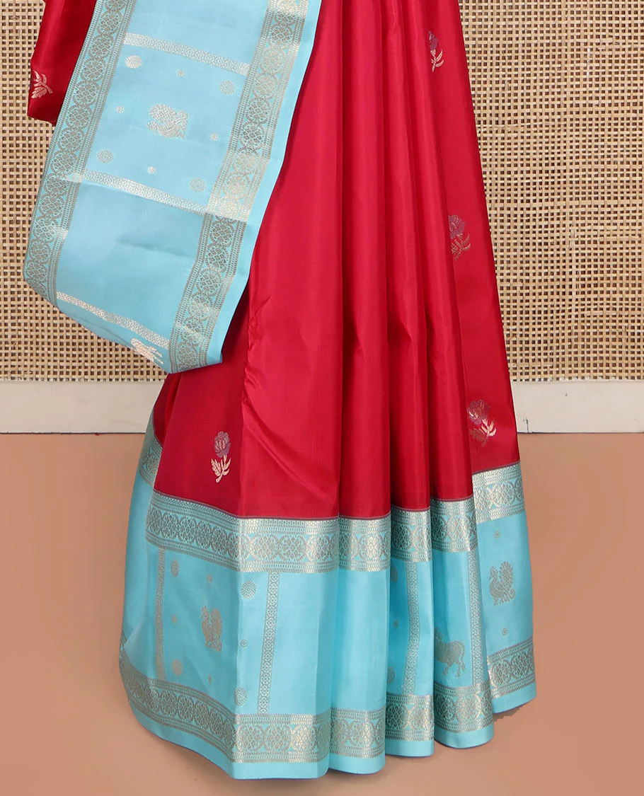 Red Vasundhara Silk Saree, Embellished with Floral Buttas on Its Body, Complemented by Contrast Border of Kodi Visiry, Annam, Pichwai Cow and Lotus Designs, Meticulously Crafted Pallu, and Paired with a Contrast Blouse - Image 4