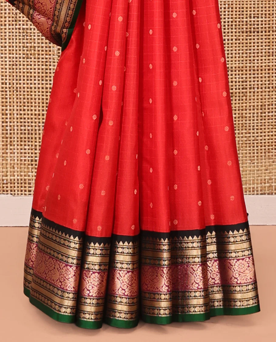 Red Vasundhara Silk Saree, Sparsely Woven with Zari Buttas All Over Its Body, Complemented by a Contrast Border of Rekku, Muthu, Poun, Kathir, and Mayil Designs, Beautifully Bedecked Pallu, and Paired with a Contrast Blouse - Image 4