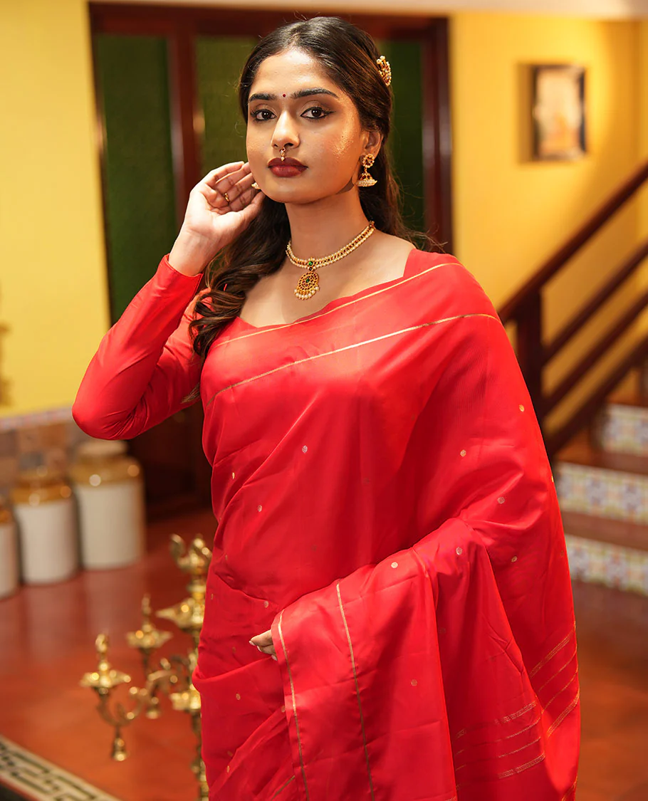 Red Vasundhara Lite Silk Saree, Subtly Sparkled with Paisa Zari Buttas Across Its Body, Highlighted Zari Border of Horizontal Stripes, Gleaming Pallu of Seppu Rekku Designs, and Paired with a Matching Blouse - Image 3
