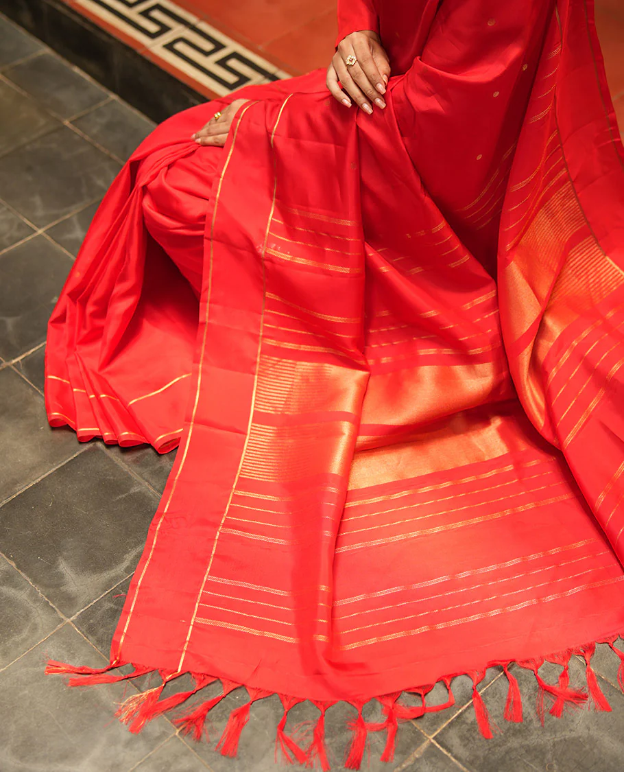 Red Vasundhara Lite Silk Saree, Subtly Sparkled with Paisa Zari Buttas Across Its Body, Highlighted Zari Border of Horizontal Stripes, Gleaming Pallu of Seppu Rekku Designs, and Paired with a Matching Blouse - Image 5