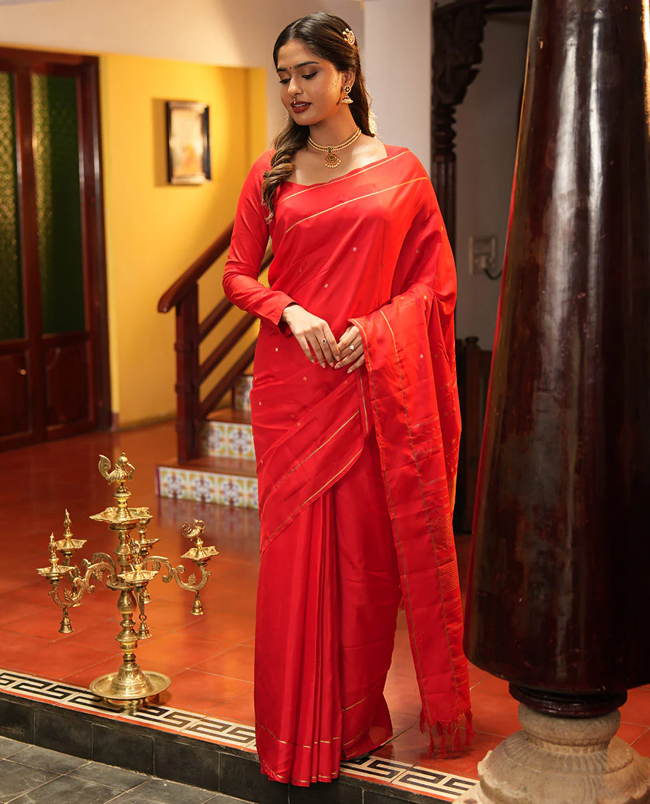 Red Vasundhara Lite Silk Saree, Subtly Sparkled with Paisa Zari Buttas Across Its Body, Highlighted Zari Border of Horizontal Stripes, Gleaming Pallu of Seppu Rekku Designs, and Paired with a Matching Blouse - Image 6