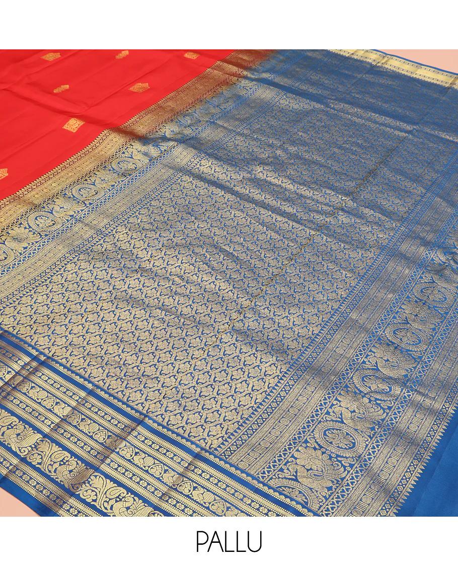 Red Vasundhara Silk Saree, Subtly Sparkled With Zari Buttas All Over Its Body, Complemented by Contrast Border of Salngai, Muthu, Kamalam, Jada Nagam, and Mayil Designs, Grand Pallu and Paired with a Contrast Blouse - Image 5
