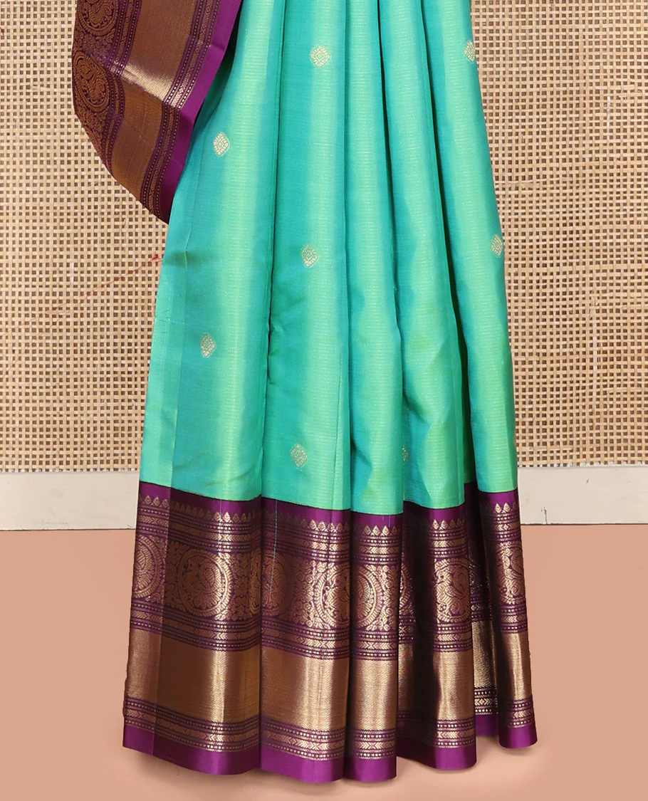 Rexona Green Vasundhara Silk Saree, Beautified with Sparse Stripes and Zari Buttas, Complemented by a Contrast Border of Thilakam, Banaras, Muthu, and Round Mayil Designs, Pallu Steeped with Traditional Designs, and Paired with a Contrast Blouse - Image 10