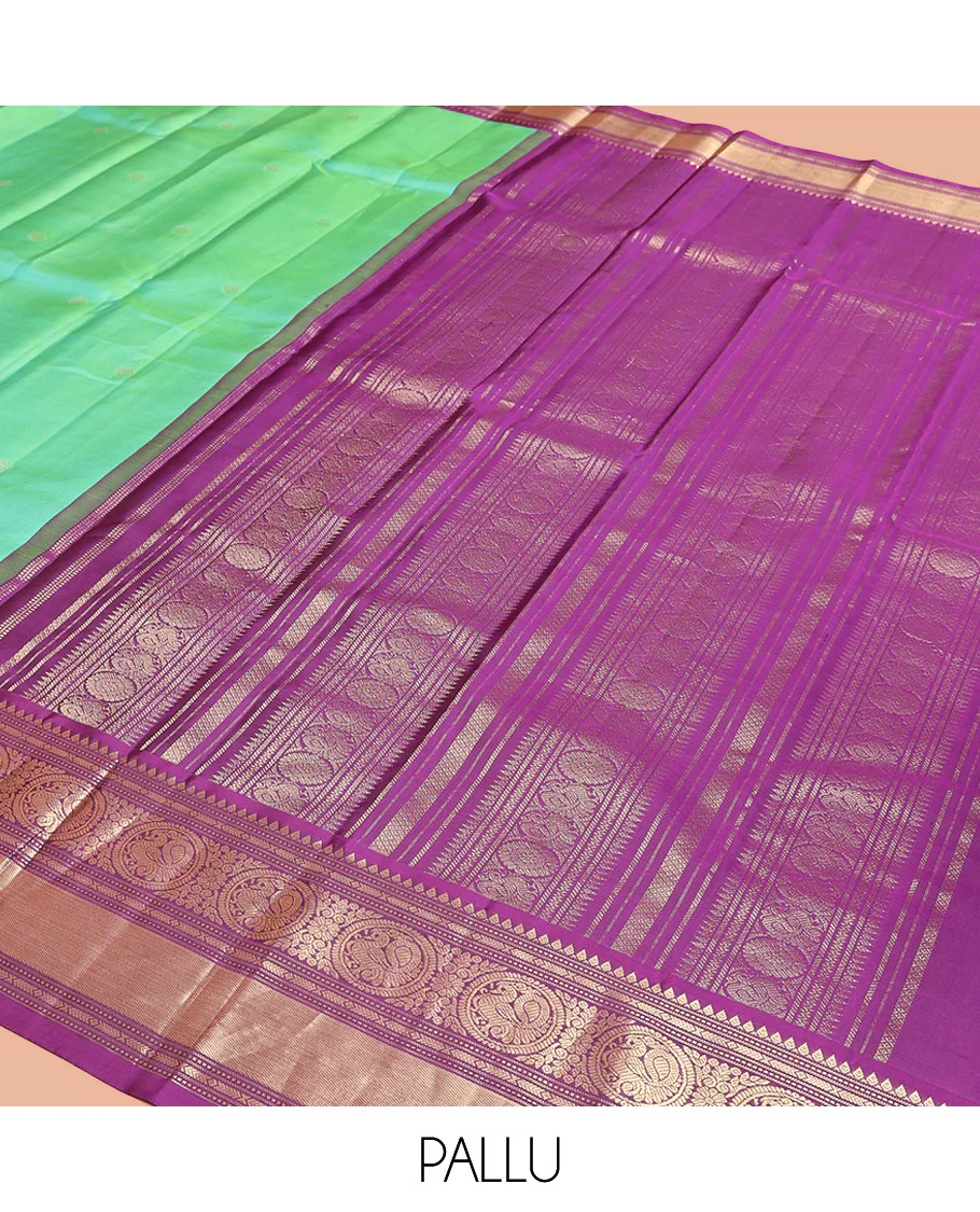 Rexona Green Vasundhara Silk Saree, Beautified with Sparse Stripes and Zari Buttas, Complemented by a Contrast Border of Thilakam, Banaras, Muthu, and Round Mayil Designs, Pallu Steeped with Traditional Designs, and Paired with a Contrast Blouse - Image 11
