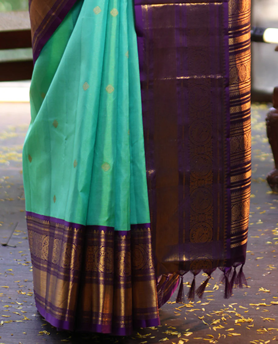 Rexona Green Vasundhara Silk Saree, Beautified with Sparse Stripes and Zari Buttas, Complemented by a Contrast Border of Thilakam, Banaras, Muthu, and Round Mayil Designs, Pallu Steeped with Traditional Designs, and Paired with a Contrast Blouse - Image 6