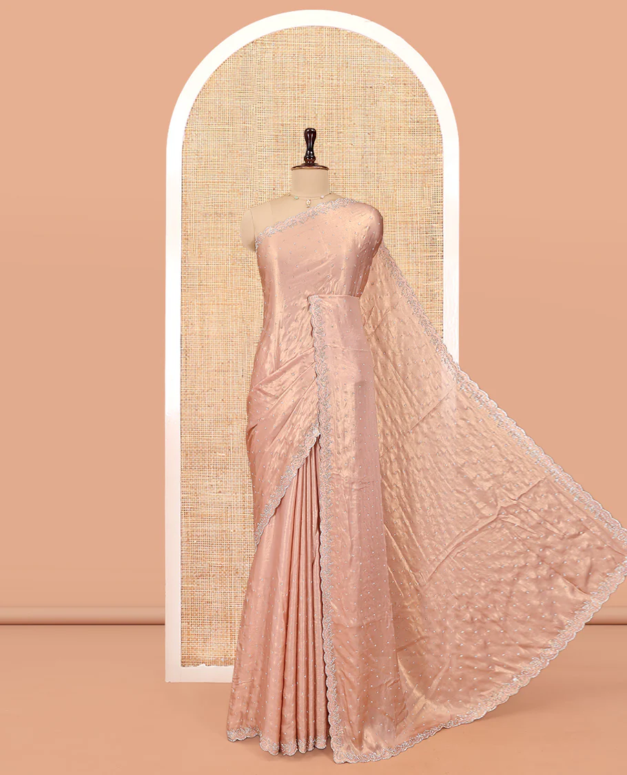 Rose Gold  Designer Saree, Gleamed up with Stone Struck All Over Its Body, Scallop Stone Embroidered Border, and Heavy Embroidered Matching Blouse
