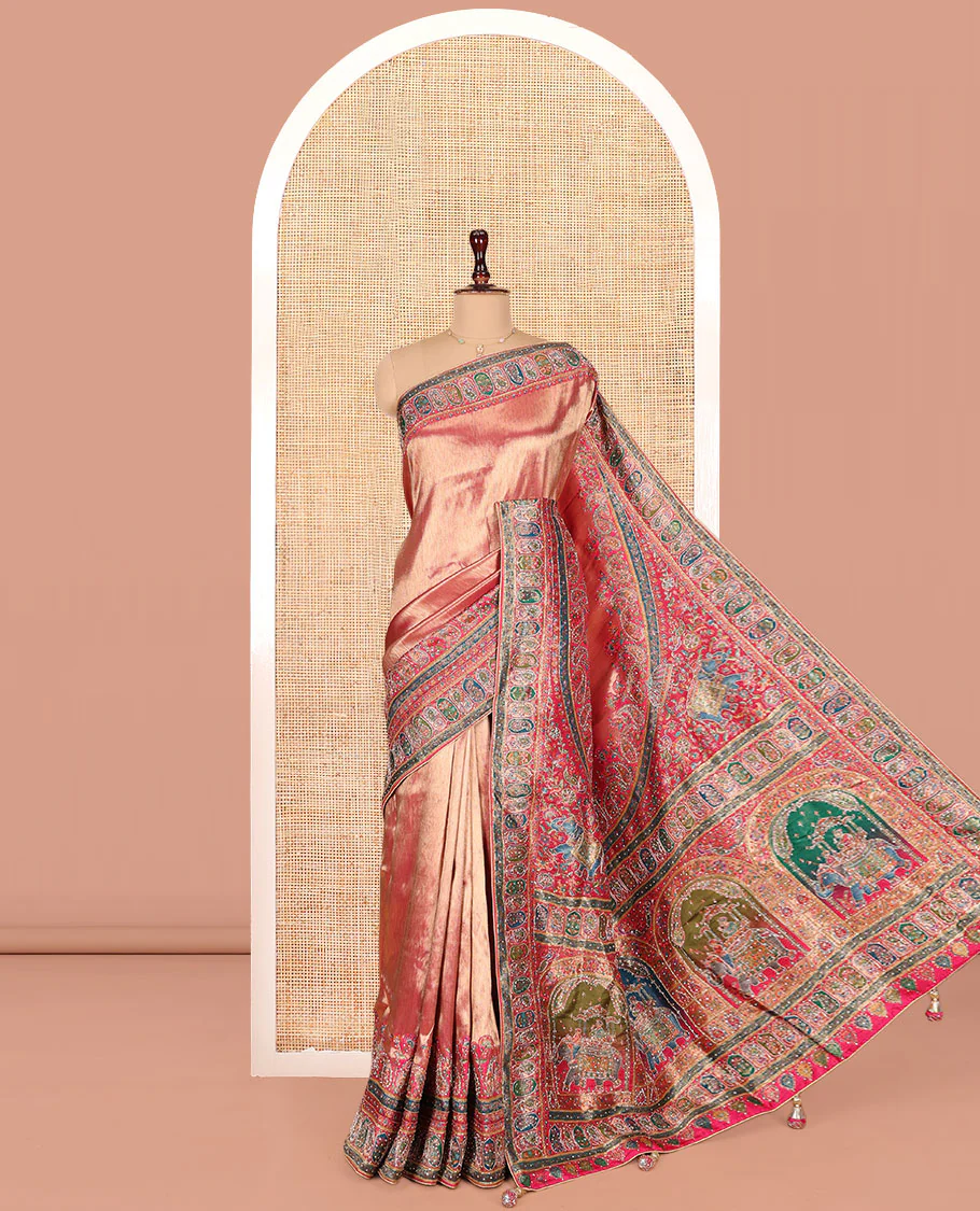Rose Gold Dola Silk Saree, Sparsely Adorned with Chevron Design, Complemented by Contrast Mughal-Style Patterns Print and Embroidered Border, Intricately Designed Pallu, and Paired with a Matching Blouse