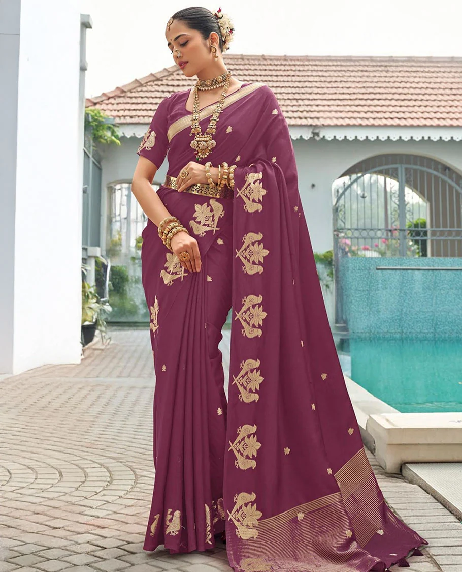 Rosewood Pink Designer Saree Adorned with Zari Buttas, Featuring a Self-Border Depicting Parrot Motifs, Subtly Woven Pallu of Spare Stripes, and Paired with a Matching Blouse of Parrot Motifs