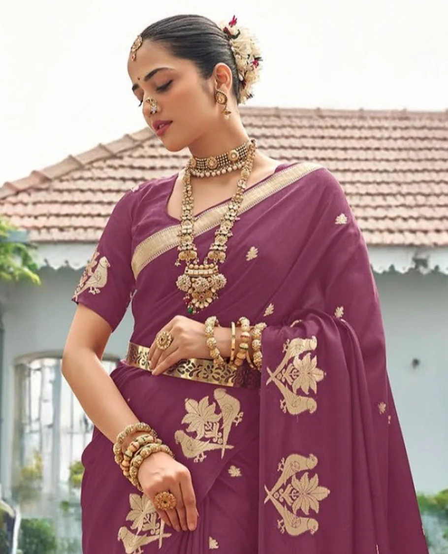 Rosewood Pink Designer Saree Adorned with Zari Buttas, Featuring a Self-Border Depicting Parrot Motifs, Subtly Woven Pallu of Spare Stripes, and Paired with a Matching Blouse of Parrot Motifs - Image 2