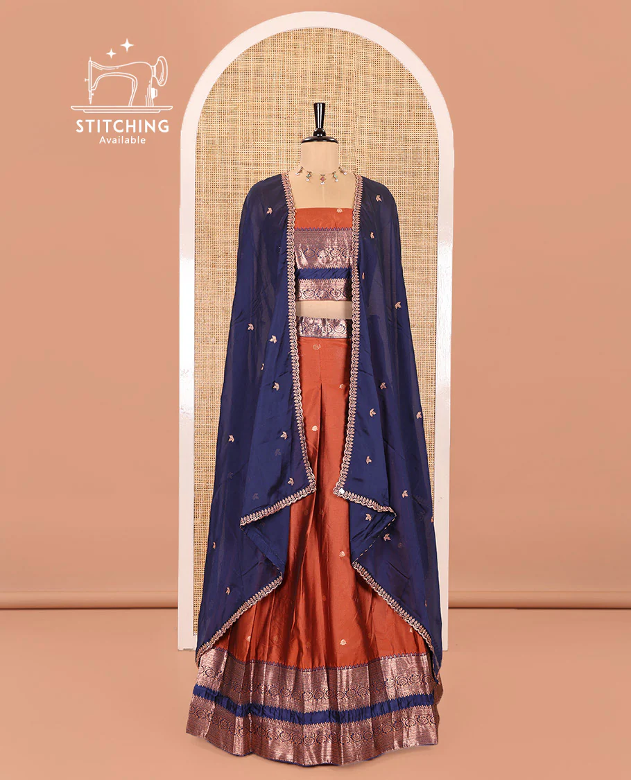 Rust and Blue Semi-Banarasi Half-Saree Featuring Zari Buttas Skirt, Complemented by Contrast Rettai Pettu, Traditional Border of Floral Creeper Designs, Paired with a Matching Blouse, and a Satin Georgette Embroidered Scallop Dhavani - Image 2