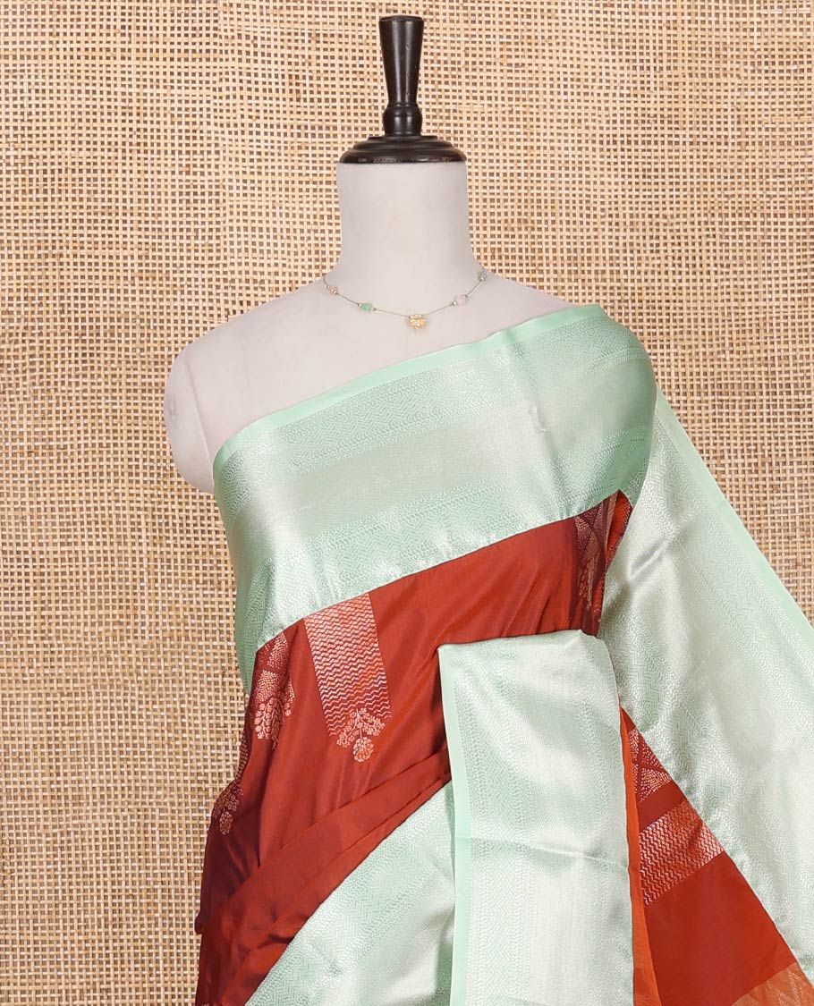 Rust Budget Silk Saree, Elevated with Zari Buttas on Its Body, Complemented by a Contrast Traditional Zari Design Border, Chevron Design Pallu, and Paired with a Contrast Blouse - Image 2
