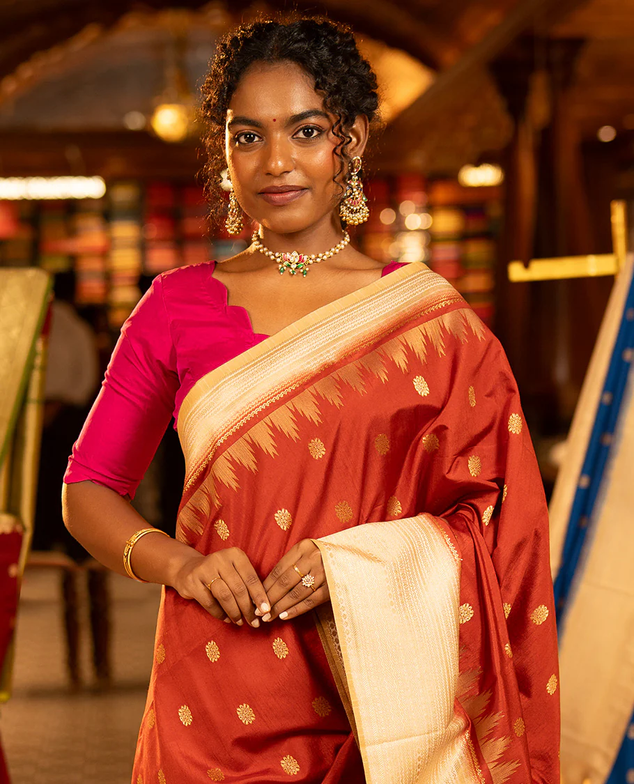Rust Dupion Silk Saree, Decked Up with Zari Buttas All Over Its Body, Complemented by a Contrast Temple Traditional Zari Design Woven Border, Traditional Pallu of Temple Designs, and Paired with a Contrast Blouse - Image 2