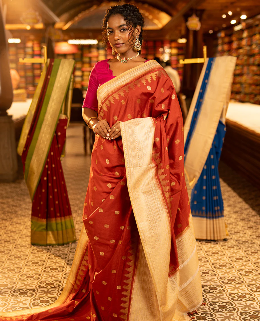 Rust Dupion Silk Saree, Decked Up with Zari Buttas All Over Its Body, Complemented by a Contrast Temple Traditional Zari Design Woven Border, Traditional Pallu of Temple Designs, and Paired with a Contrast Blouse - Image 3