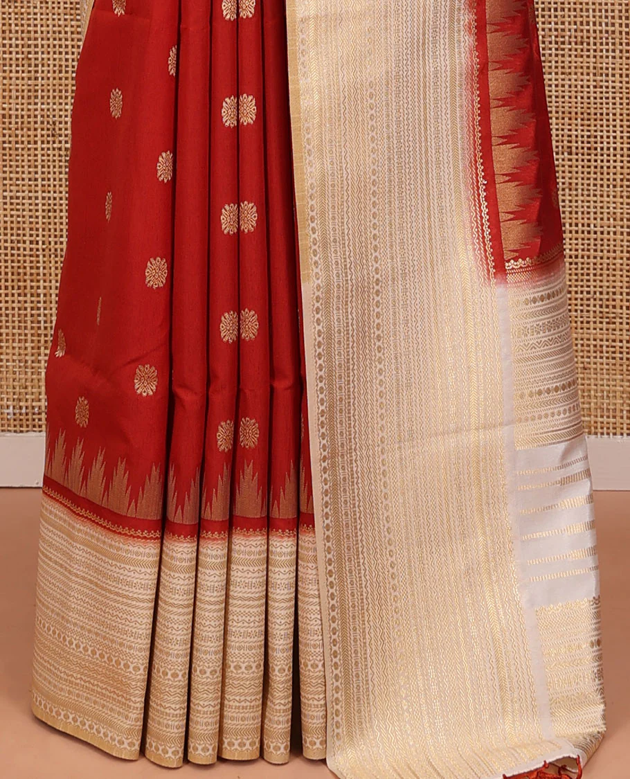 Rust Dupion Silk Saree, Decked Up with Zari Buttas All Over Its Body, Complemented by a Contrast Temple Traditional Zari Design Woven Border, Traditional Pallu of Temple Designs, and Paired with a Contrast Blouse - Image 7