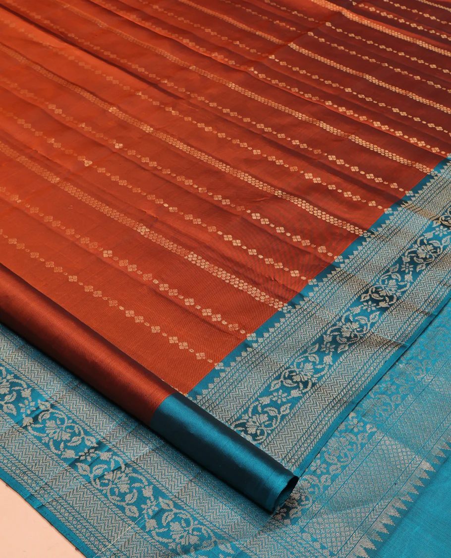 Rust Mayuri Lite Silk Mix Saree, Finely Crafted with Zari Designs All Over Its Body, Complemented by a Contrast Border of Vanki and Floral Designs, Beautifully Bedecked Pallu, and Paired with a Contrast Blouse - Image 2