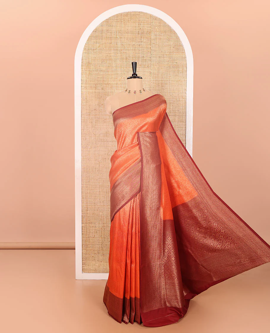 Rust Orange Luxury Soft Silk Saree Featuring Leaf Jacquard Design on Its Body, Highlighted with a Contrast Traditional Zari Design Border, Pallu Decked Up with Intricate Designs, and Paired with a Contrast Jacquard Blouse