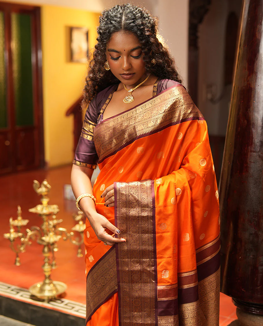 Rust Orange Vasundhara Silk Saree, Embellished with Mayil and Yaanai Buttas Across Its Body, Complemented by a Contrast Korvai Border of Rekku, Banaras, Yaanai, and Chakram Designs, Gleaming Jaal Pallu, and Paired with a Contrast Blouse - Image 5