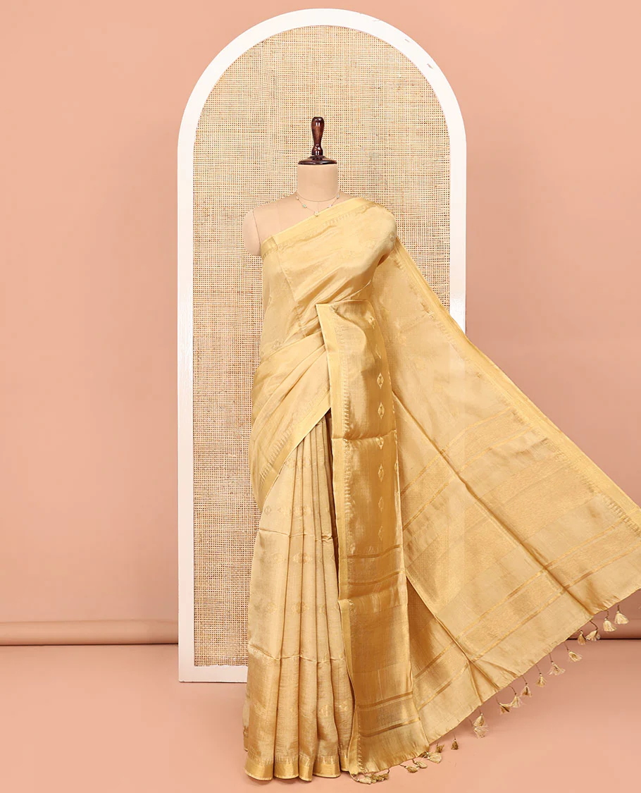 Sandal Banana Pith Saree, Subtly Sparkled with Buttas All Over Its Body, Subtle Border, Striped Pallu, and Paired with a Matching Blouse