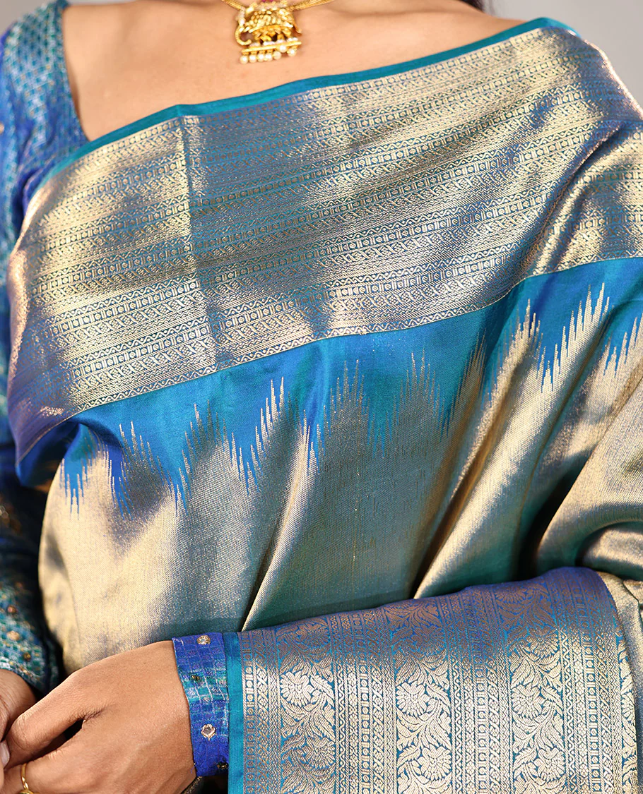 Scintillating Blue Vasundhara Lite-Silk Mix Saree, Gleamed Up with Zari on Its Body, Highlighted by Thazampoo Rekku Border of Neli, Paisa, Cross Kamalam, and Kodi Visiry Designs, a Grand Geometric-Patterned Pallu, and Paired with a Matching Blouse - Image 2