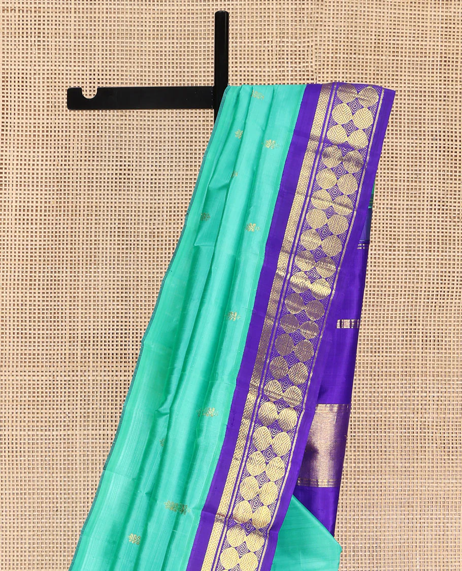 Turquoise Kanchipuram Silk Saree, Beautified with Zari Buttas on Its Body, Complemented by a Contrast One-Sided Korvai Border of Vanki, Banaras, and Rudraksham Designs, Pallu of Zari Designs, and Comes Without a Blouse - Image 3