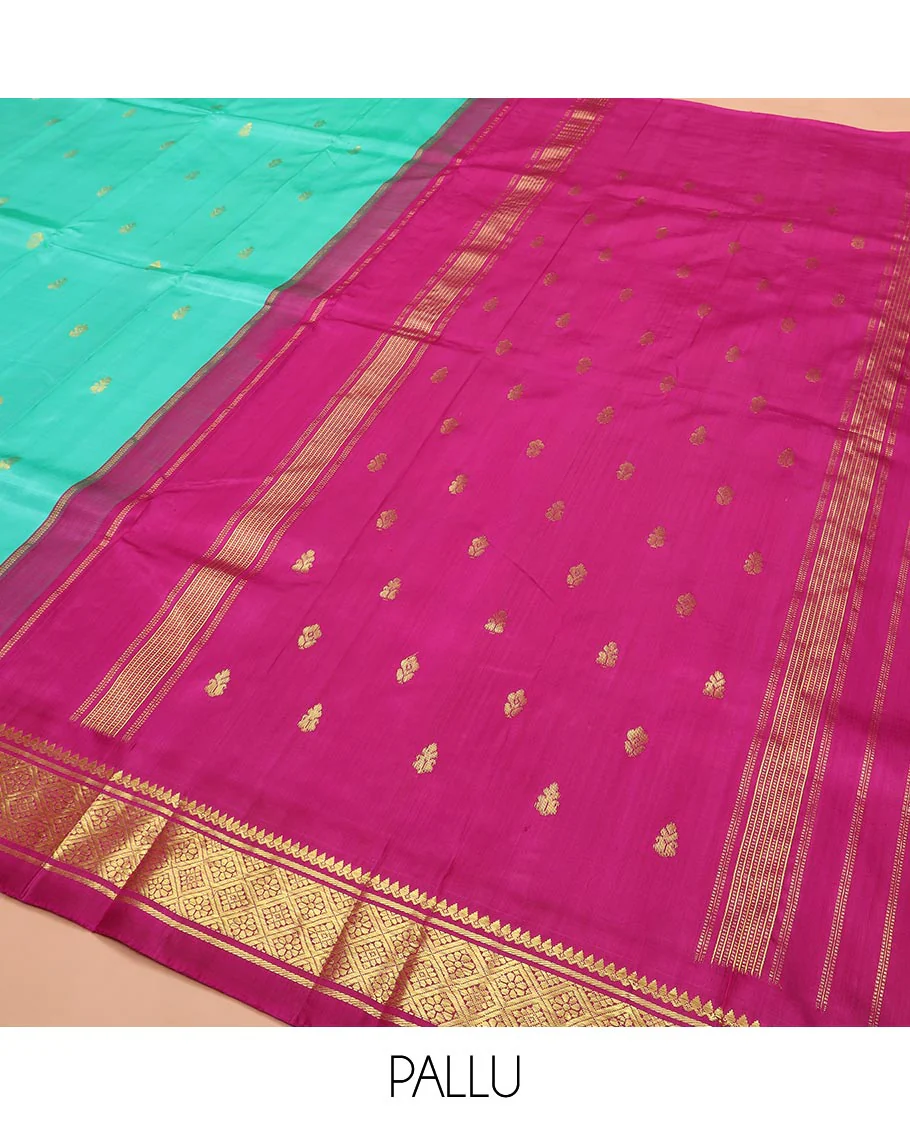 Turquoise Kanchipuram Silk Saree Bedecked with Zari Buttas All Over Its Body, Complemented by a Contrast One-Sided Korvai Border of Thilakam Mokku, Banaras, and Jaal Designs, Pallu of Zari Designs, and Comes Without a Blouse - Image 5