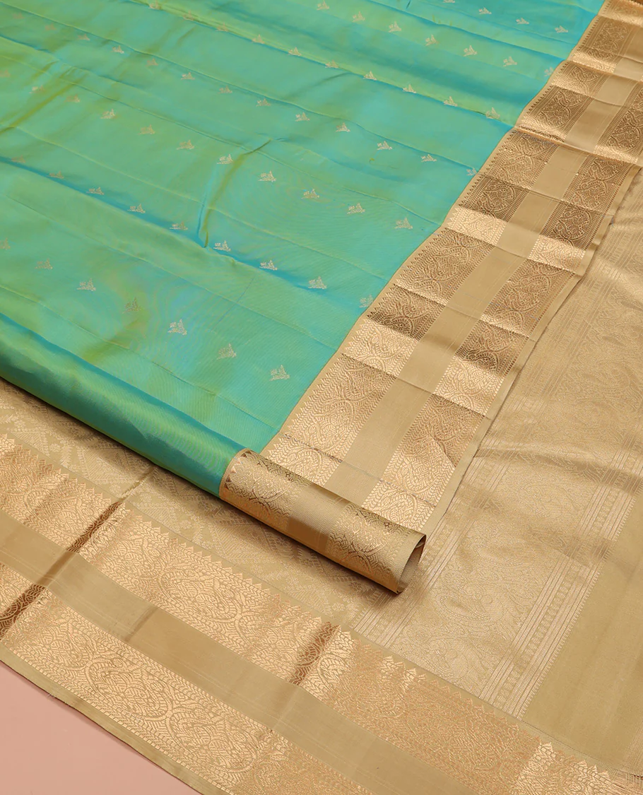 Turquoise Vasundhara Silk Saree, Crafted with Zari Buttas All Over Its Body, Complemented by a Contrast Rettai Pettu Border of Rekku, Muthu, Kathir, and Mayil Designs, Intricately Designed Pallu, and Paired with a Contrast Blouse - Image 2