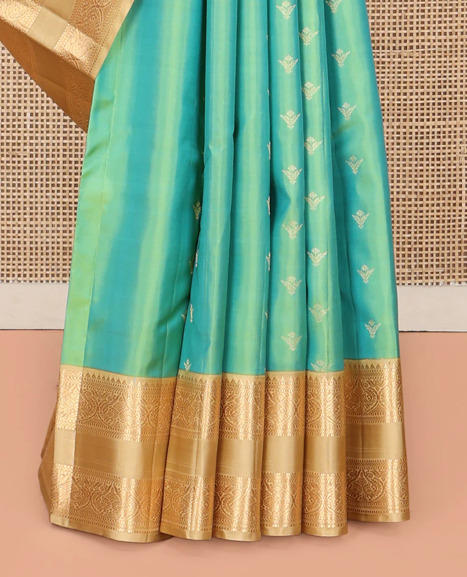 Turquoise Vasundhara Silk Saree, Crafted with Zari Buttas All Over Its Body, Complemented by a Contrast Rettai Pettu Border of Rekku, Muthu, Kathir, and Mayil Designs, Intricately Designed Pallu, and Paired with a Contrast Blouse - Image 4