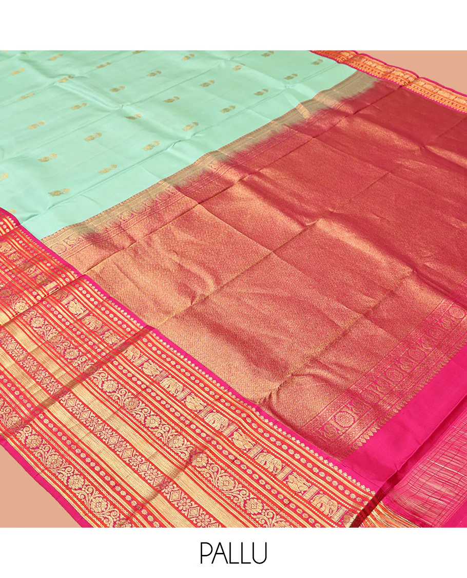 Turquoise Vasundhara Silk Saree, Embellished with Zari Buttas All Over Its Body, Complemented by a Contrast Border of Thilakam Mokku, Yaanai, Iruthalai Pakshi, and Kodi Visiry Designs, Grand Pallu, and Paired with a Contrast Blouse - Image 5