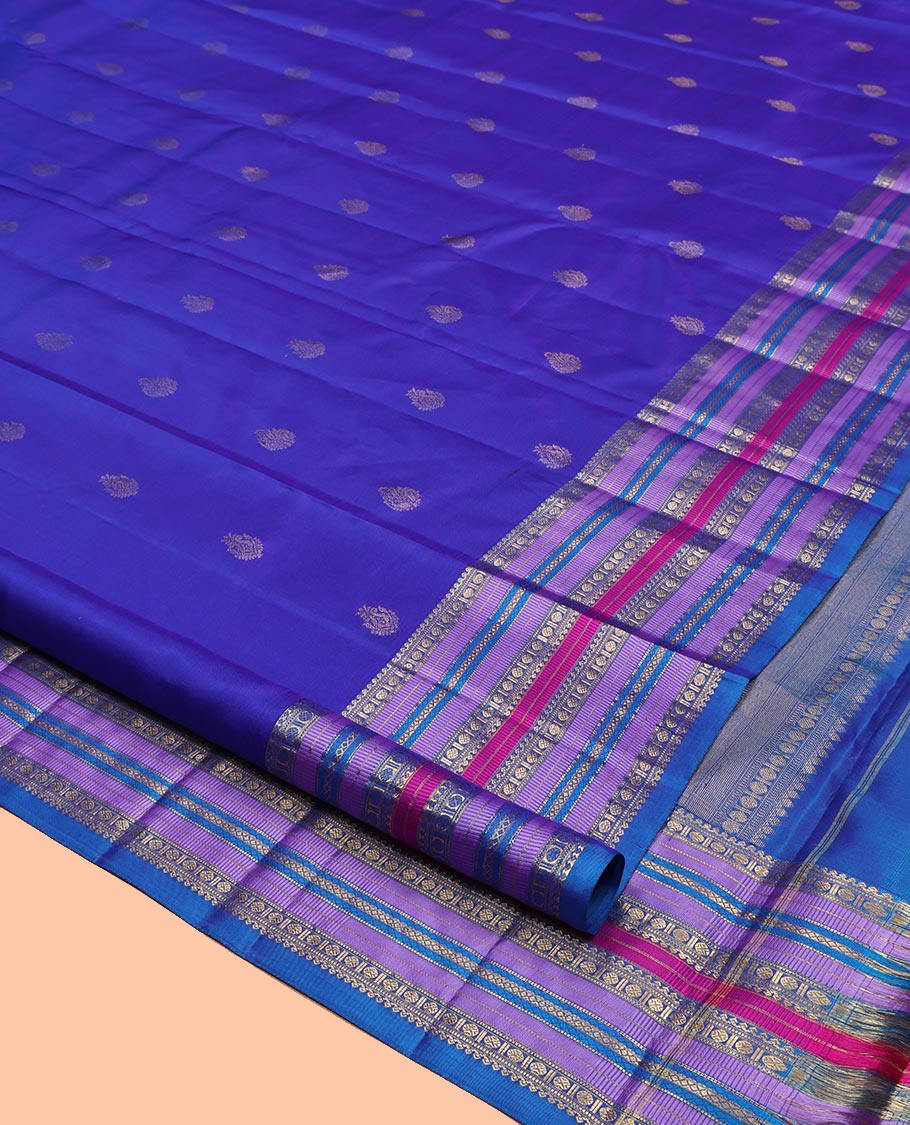 Violet and Mayil Blue Vasundhara Silk Saree, Subtly Sparkled with Zari Buttas All Over Its Body, Highlighted by Self-Border of Thilakam Mokku, Rudraksham, Muthu, and Mayil Kann Designs, Diagonally Striped Pallu, and Paired with a Matching Blouse - Image 2