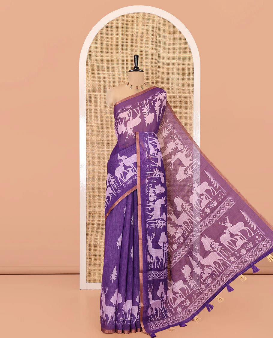 Violet Christmas-Themed Linen Cotton Saree, Accentuated with Christmas Tree Motifs Printed on Its Body, a Subtle Piping Border, Pallu of Christmas-Themed Print, and Paired with a Contrast Floral Printed Blouse