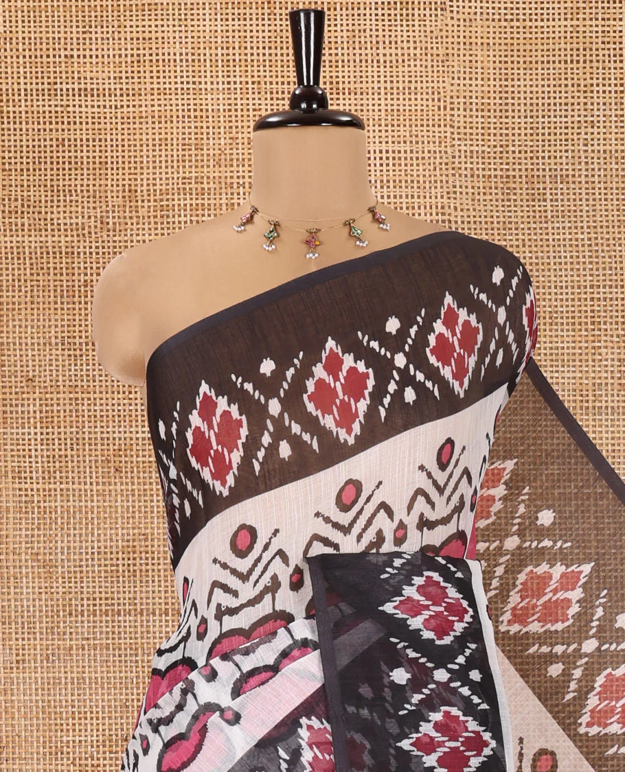 White and Black Linen Cotton Saree, Colorful Ikat Woven On Its Body, Complemented by Contrast Ikkat Geometric Border, Pallu Steeped with Buttas and Paired with a Contrast Blouse - Image 2