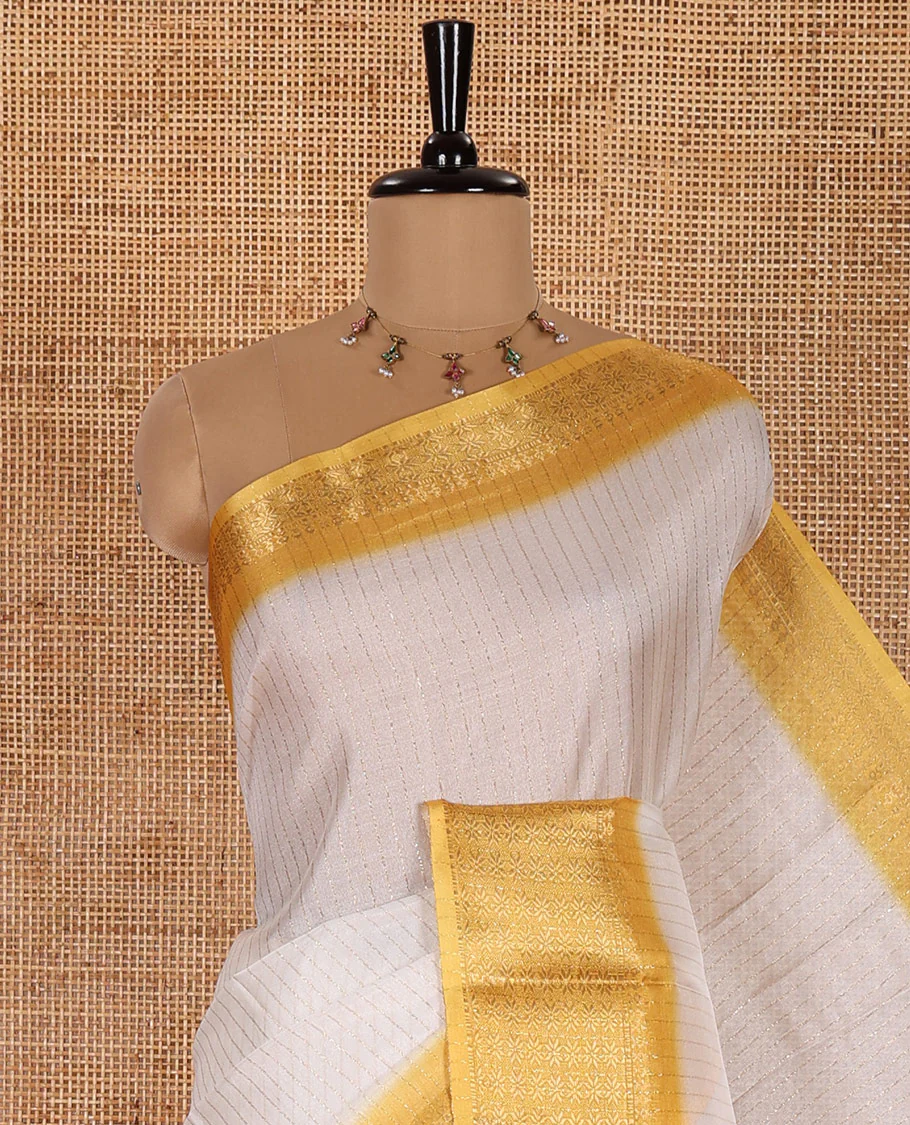 White and Yellow  Dola Silk Saree Decked Up with Vertical Zari Stripes All Over the Body, Complemented by a Contrast Border of Traditional Zari Designs, Self-Pallu of Stripes, and Paired with a Contrast Blouse - Image 5