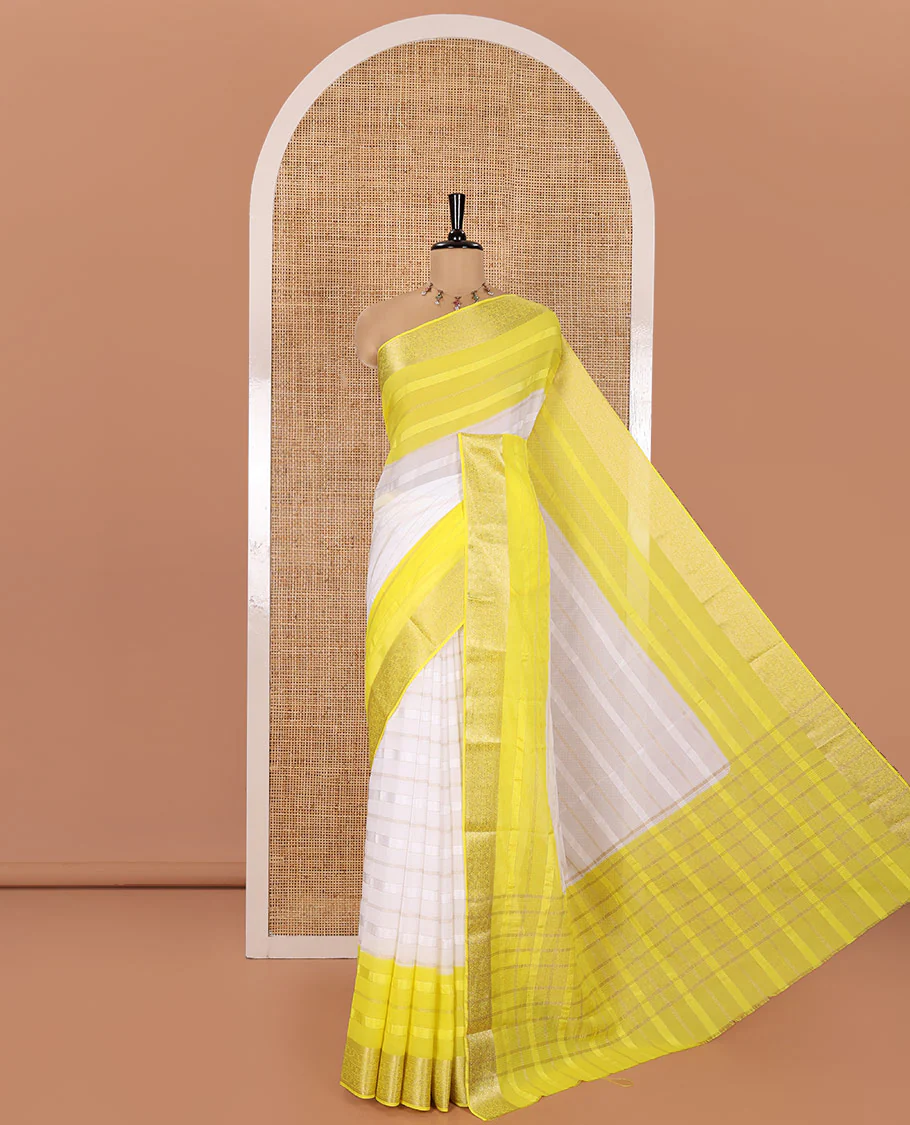 White and Yellow Georgette Saree, Subtly Sparkled with Horizontal Zari Stripes All Over Its Body, Complemented by a Contrast Traditional Zari Design Border, Gleaming Zari Striped Pallu, and Paired with a Contrast Blouse