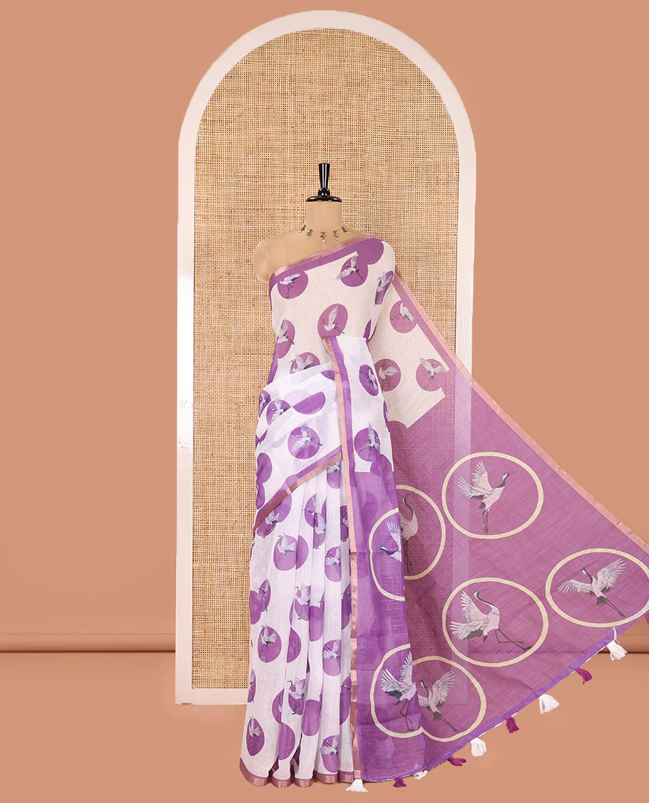 White-Lavender Linen Cotton Saree, Steeped with Polka Dot Enclosed Crane Motifs on Its Body, Subtle Piping Border, Pallu Pictures Polka Dot Enclosed Crane Motifs, and Paired with a Matching Blouse