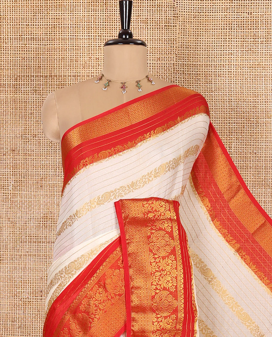 White Moss Chiffon Saree, Beautified with Horizontal Stripes, Peacock, and Floral Buttas All Over Its Body, Complemented by a Contrast Traditional Zari Border, Pallu Mirrors the Same Design, and Paired with a Contrast Floral-Paisley Blouse - Image 2