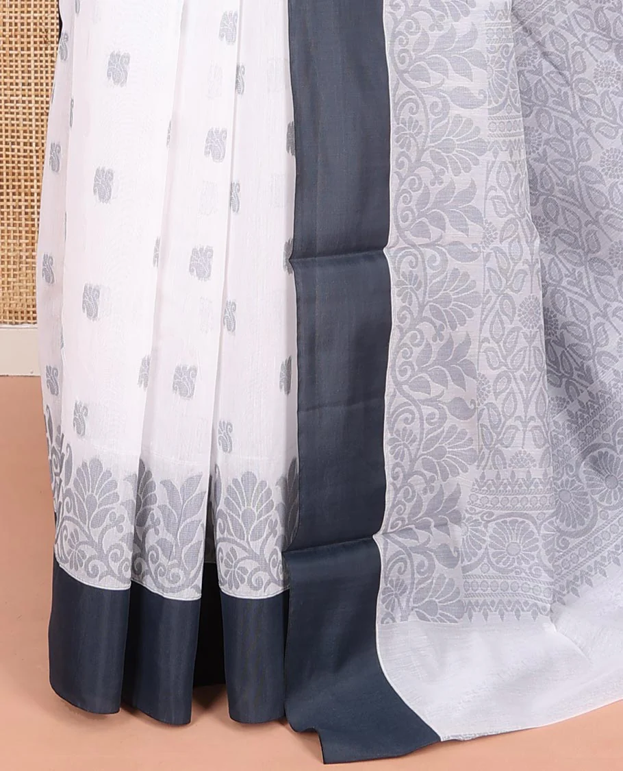 White Semi-Silk Cotton Saree, Sparsely Woven with Buttas and Floral Designs All Over Its Body, Complemented by Contrast Border, Sparsely Woven Pallu of Floral Jaal Designs, and Paired with a Matching Blouse - Image 3