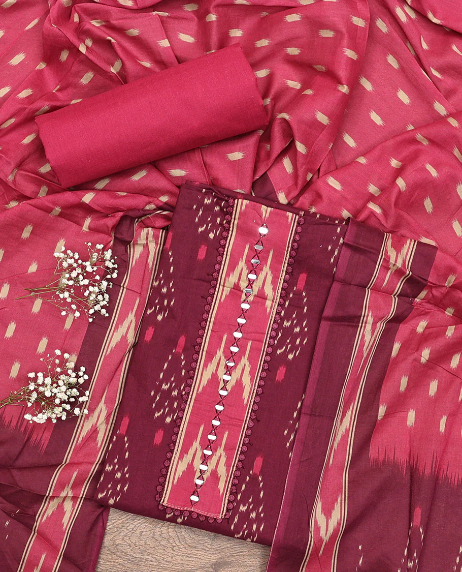 Wine Cotton Material Chudidar Set, Subtly Sparkled with Ikkat-Style Buttas on Its Top, a Plain Cotton Bottom, and Paired with a Cotton Ikkat Woven Dupatta