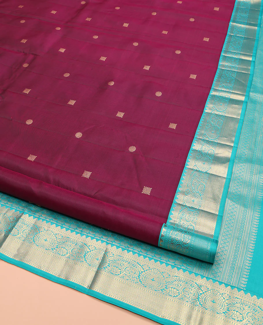 Wine Kanchipuram Silk Saree, Detailed with Zari Buttas on Its Body, Complemented by Contrast Border of Rekku, Muthu, Thilakam, and Mayil Kann Designs, Grandly Woven Pallu, and Paired with a Contrast Blouse - Image 2