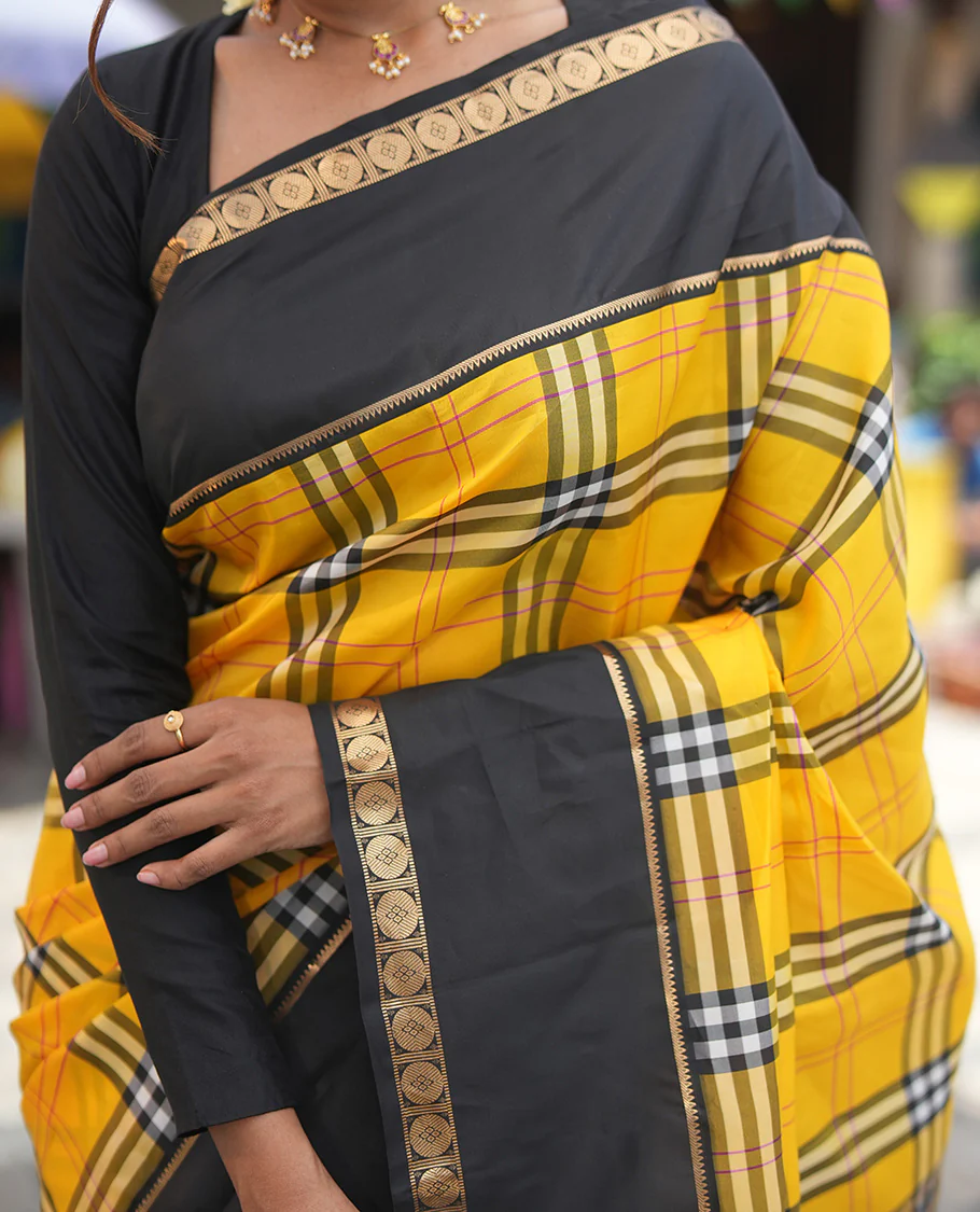 Yellow-Black Vasundhara Lite Silkmix Saree Features Checks, Contrast Rettai Pettu Rekku-Poun Border, Zari-Striped Pallu, and a Contrast Blouse - Image 2
