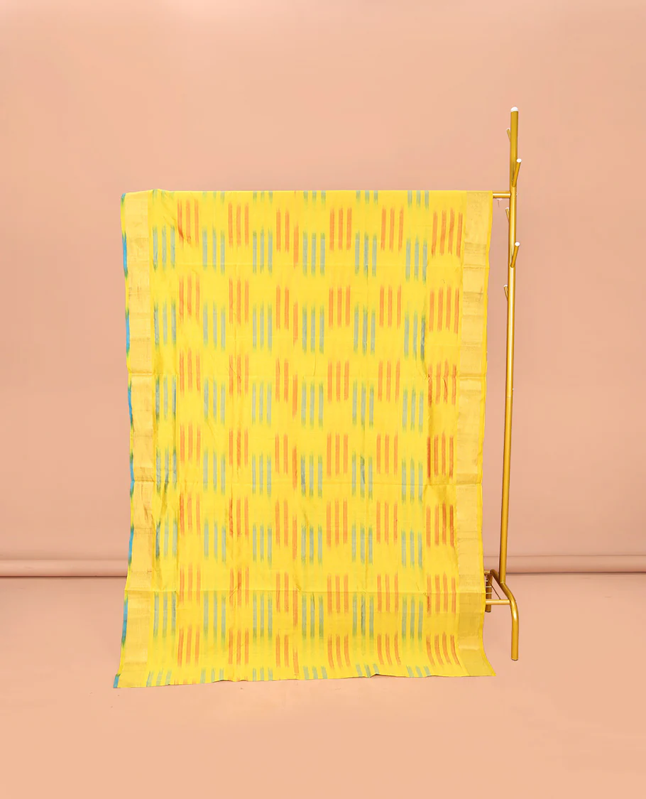 Yellow-Blue Poly Cotton Saree, Subtly Sparkled with Buttas all over its Body, a Subtle Border, Complemented by Contrast Pallu of Stripes, and Paired with a Contrast Blouse