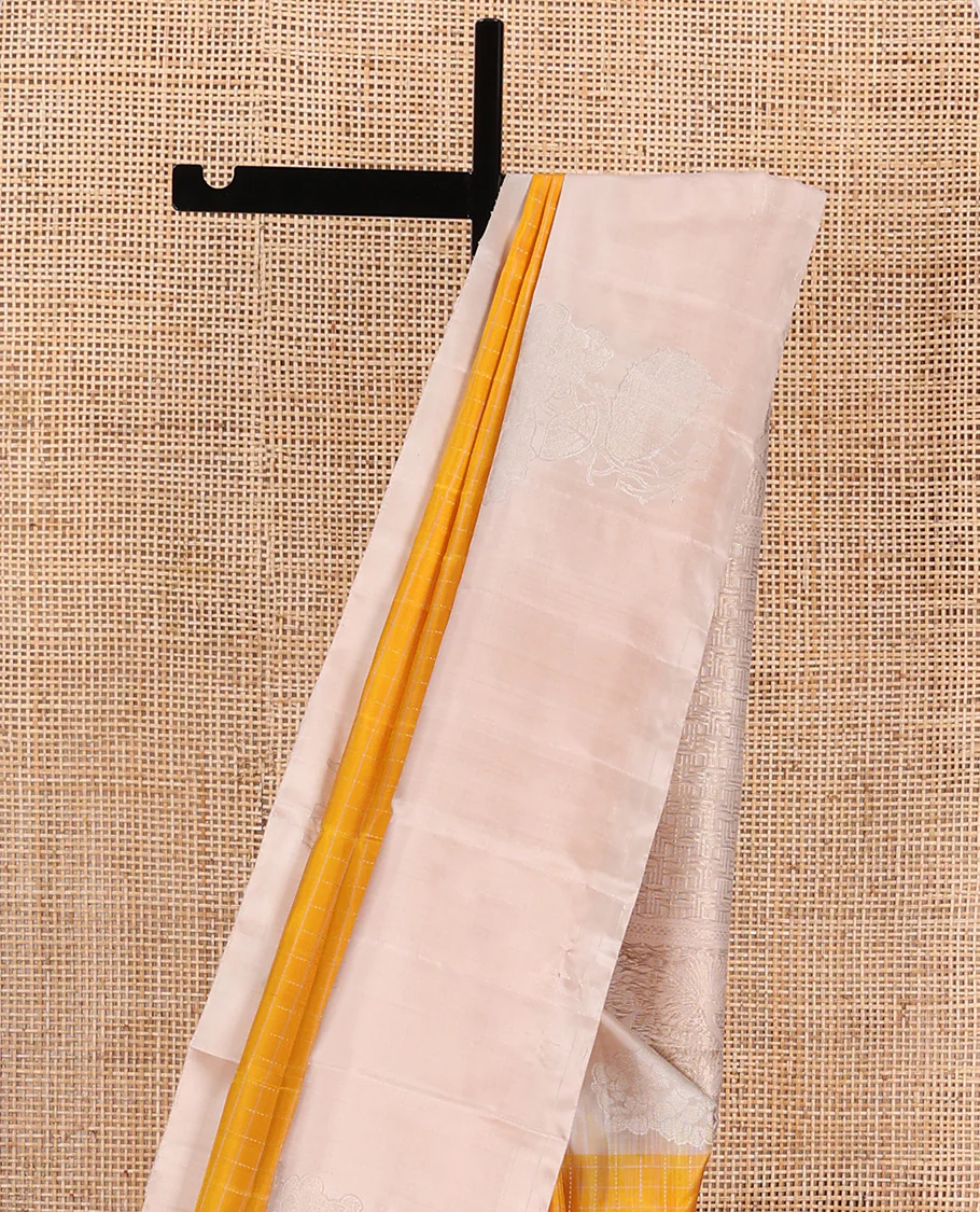 Yellow checked Kanchipuram silk saree, contrast border of zari buttas, and pallu of geometric patterns - Image 3