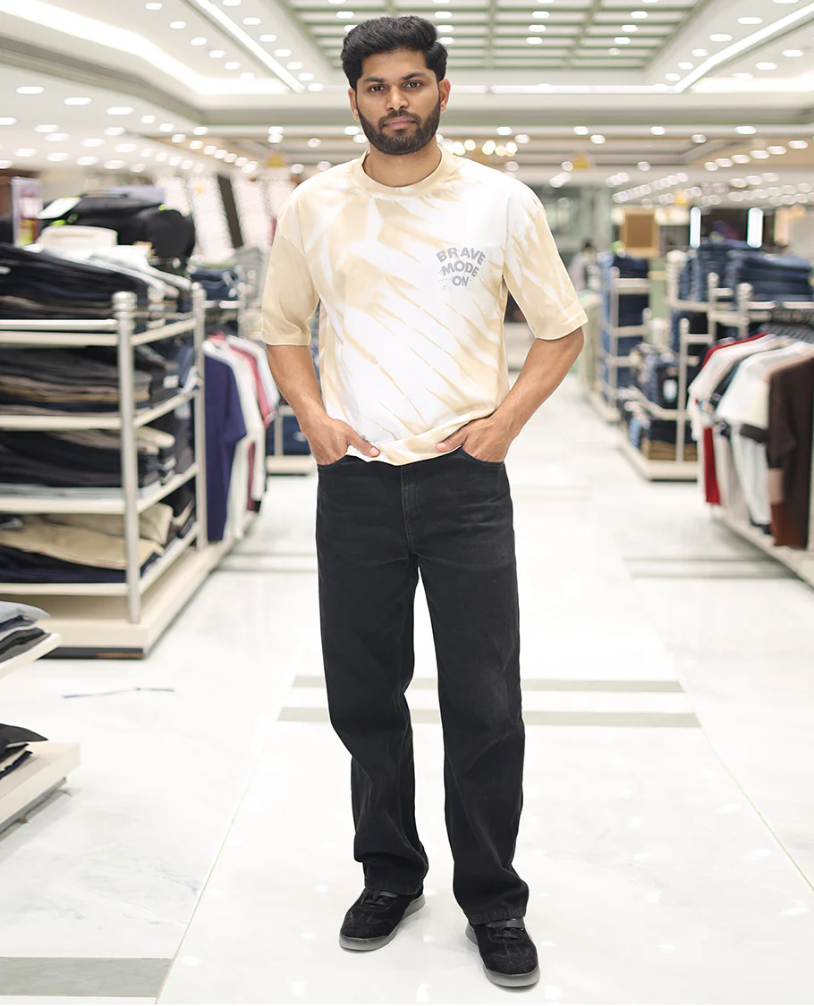Yellow Cotton-Blended T-Shirt, Enriched with Typography Print, Comes with a Crew Neck, Half-Sleeves, Oversized Fit, and Long Length