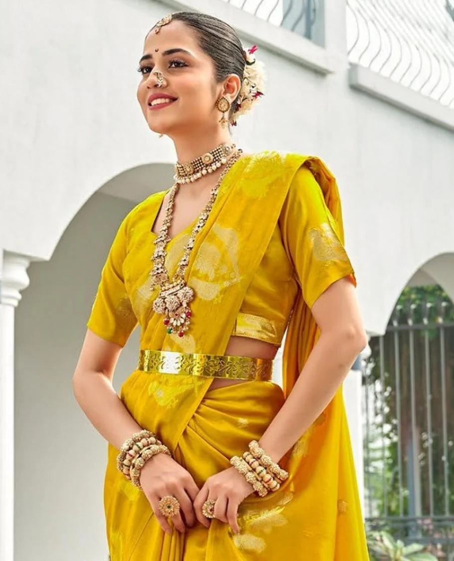 Yellow Designer Saree Detailed with Zari Buttas, Featuring a Self-Border Depicting Parrot Motifs, Subtly Woven Pallu of Spare Stripes, and Paired with a Matching Blouse of Parrot Motifs - Image 2