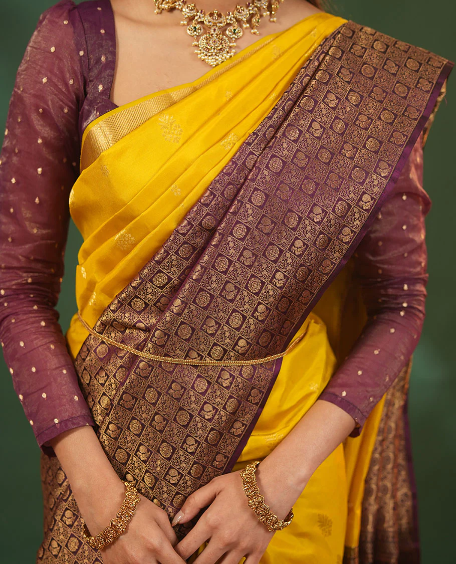 Yellow floral zari buttas woven skrit-border-style woven Vasundhara silk saree, contrast annam chakram butta enclosed checked border, and zari-rich jaal pallu - Image 2