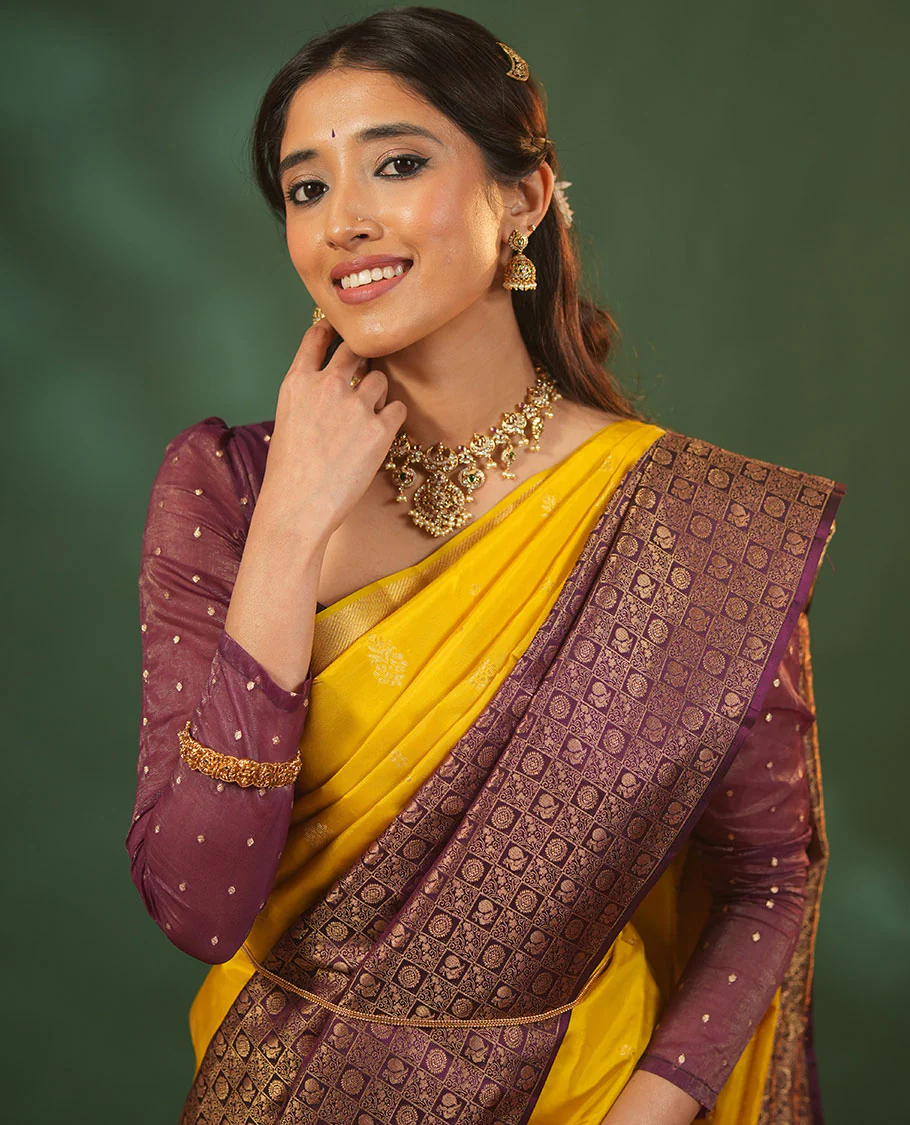 Yellow floral zari buttas woven skrit-border-style woven Vasundhara silk saree, contrast annam chakram butta enclosed checked border, and zari-rich jaal pallu - Image 3