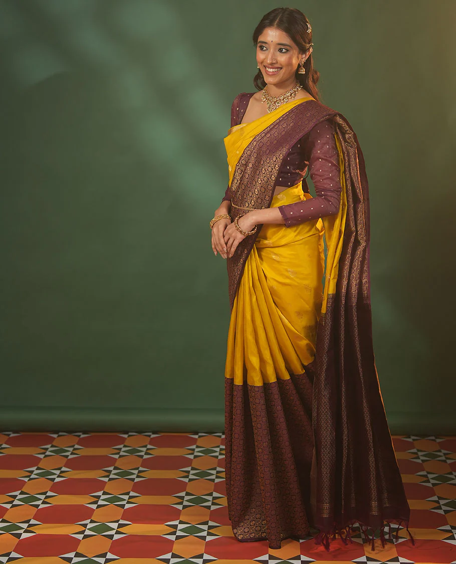Yellow floral zari buttas woven skrit-border-style woven Vasundhara silk saree, contrast annam chakram butta enclosed checked border, and zari-rich jaal pallu - Image 4