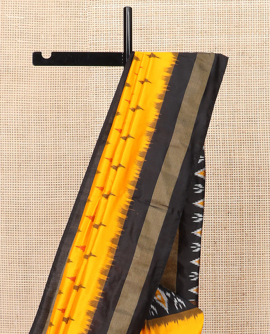 Yellow Ikkat Silk Saree Brightened with Ikkat Buttas, Complemented by a Contrast Ikkat Design Border, a Hazily Woven Pallu of Diamond Patterns, and a Contrast Blouse - Image 3